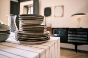 Being mindful with washing up: dishes piled on counter