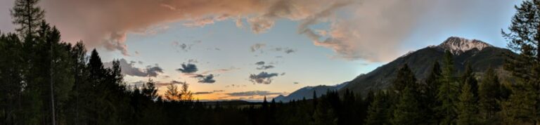 Landscape of Rocky Mountain sunset at meditation retreat center.