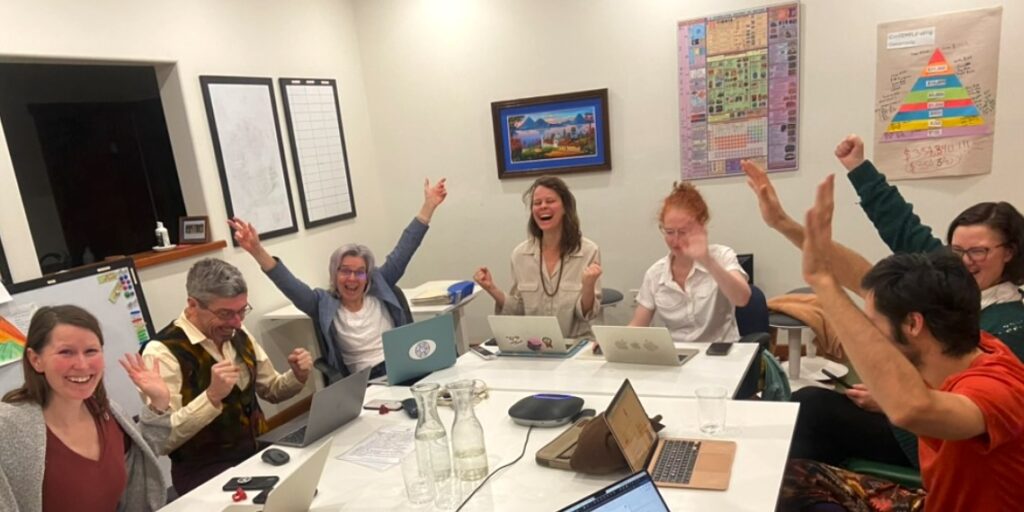 Clear Sky onsite team in the office celebrating